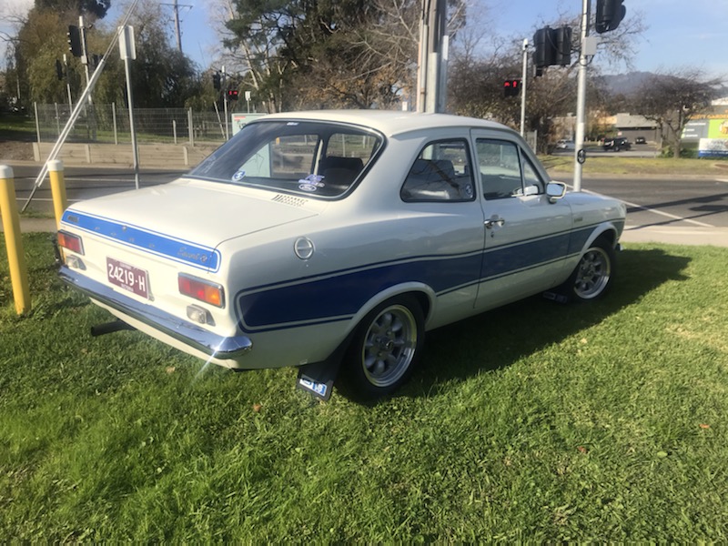 Escort shell on rotisserie after metal work